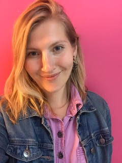 Headshot of Katrina Darychuk with a bright pink background.
